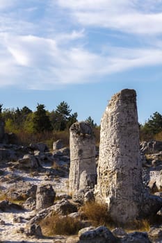Natural rock phenomenon, Pobiti Kamani, Aksakovo Municipality, Varna District, Bulgaria. In the late afternoon.Selective focus with shallow depth of field.