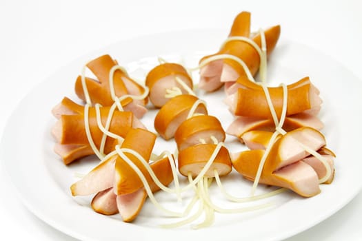Spaghetti with boiled sausages.Selective focus with shallow depth of field