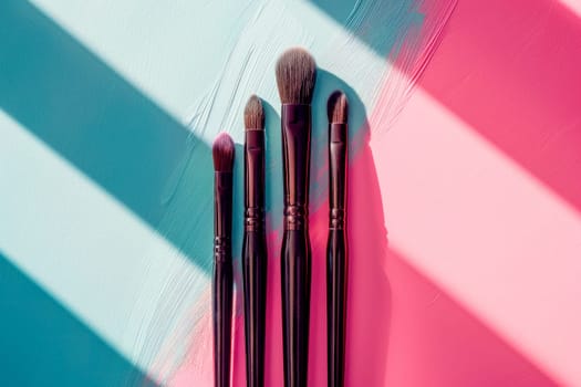 Drawing tools, set of paint brushes in row on colorful background, top view. AI generated
