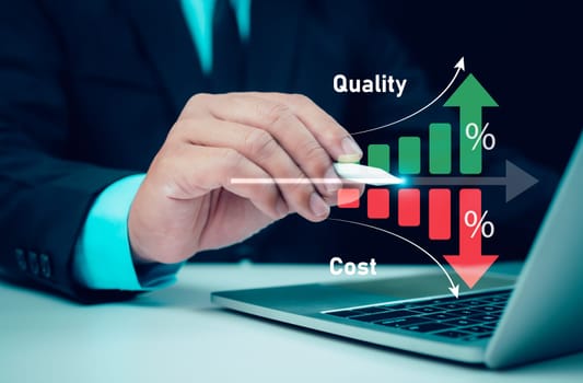 Businessman working on computer with quality control growth graph and cost reduction, Effective business, Cost and quality control, business strategy and project management concept.