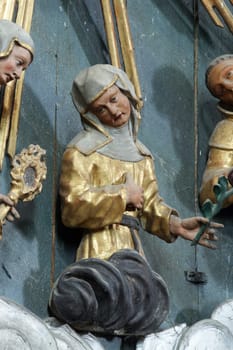 Statue of Saint on the altar of Fourteen holy helpers in the church of St. Catherine of Alexandria in Krapina, Croatia