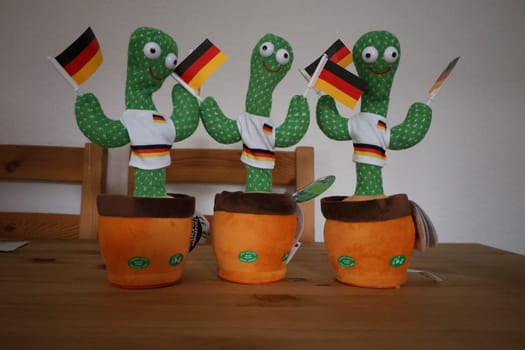 Fan merchandise such as dancing and talking fan cactus  Theme picture European Football Championship 2024 Germany