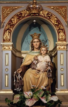 Our Lady of the Scapular, statue on the main altar in the parish church of St. Francis Xavier in Svarca, Karlovac, Croatia
