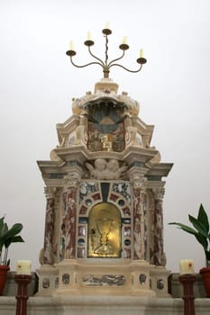 The main altar in the parish church of St. Roch in Fuskulin, Croatia