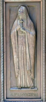 Saint Eustochia, relief on the door of St. Catherine's Church in Bethlehem, Israel