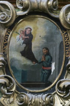 Saint Anthony holds baby Jesus, Saint Anthony altar in the church of Saint Leonard of Noblac in Kotari, Croatia