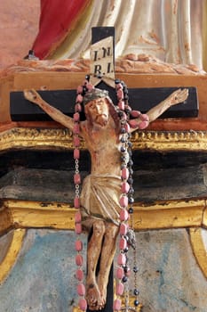 Cross on the altar of the Sacred Heart of Jesus in the parish church of St. Nicholas in Hrascina, Croatia