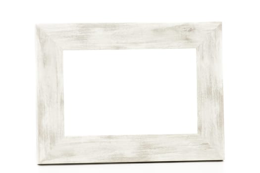 A wooden vintage photo frame has a white background