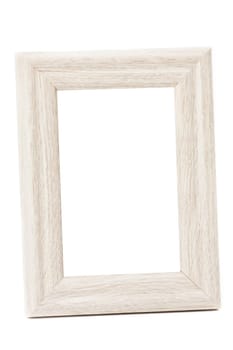 A wooden vintage photo frame has a white background