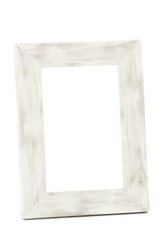 A wooden vintage photo frame has a white background