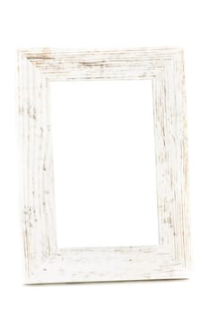 A wooden vintage photo frame has a white background