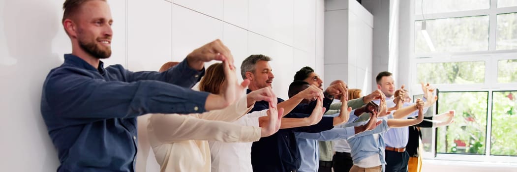 Corporate Yoga Near Business Desk. Diverse Group Workout