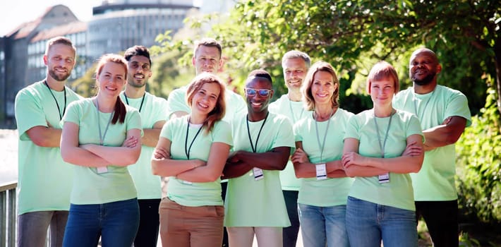 Diverse Group Of People Volunteering Community. Team Service