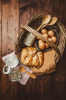 Oatmeal and potato bread on kitchen table in brown tone