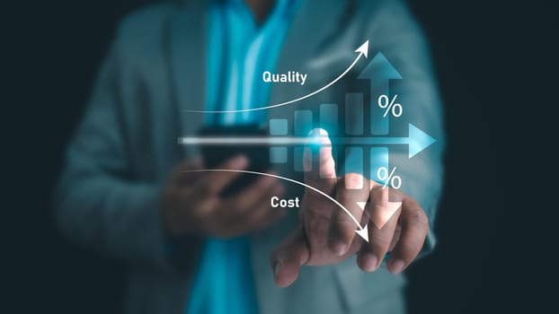 Businessman touching showing a quality control growth graph and cost reduction, Effective business, Cost and quality control, business strategy and project management concept.