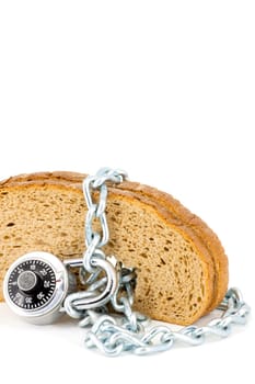 Slices of bread locked with chain and padlock on a white background