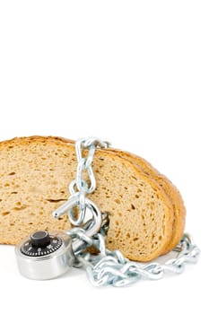 Slices of bread locked with chain and padlock on a white background