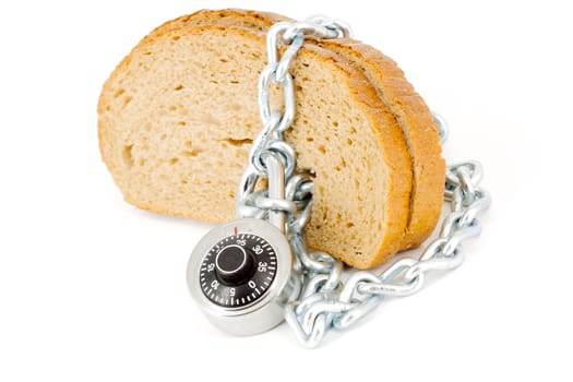Slices of bread locked with chain and padlock on a white background