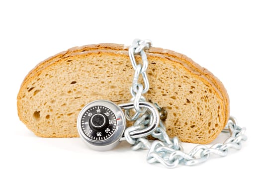 Slices of bread locked with chain and padlock on a white background