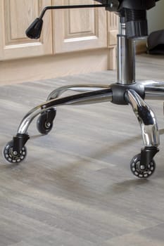 Silent, light silicone wheels on a chrome base of office chair