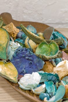 Aromatic dried fruit flowers and leaves on a wooden stand