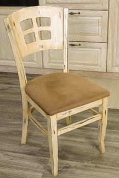 Details of vintage style kitchen furniture in beige brown color