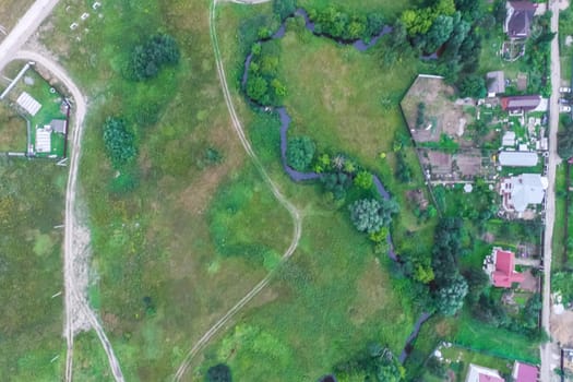 Top view of the village, fields and forests near the village