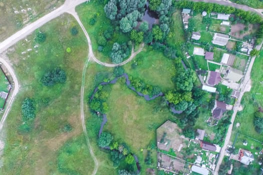 Top view of the village, fields and forests near the village