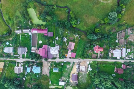 Top view of the village, fields and forests near the village