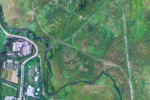 Top view of the village, fields and forests near the village