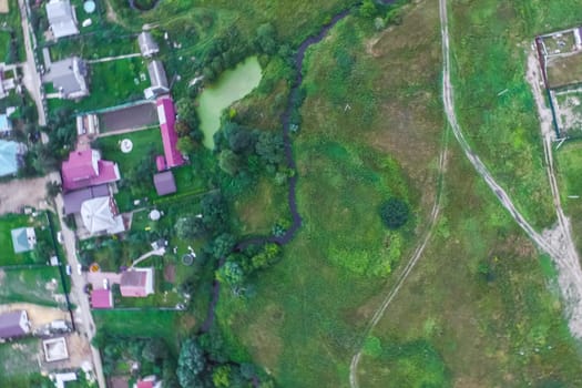 Top view of the village, fields and forests near the village