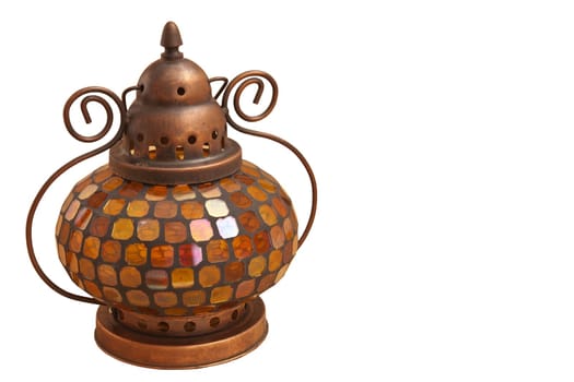 Small oriental lamp with colored glass on a white background