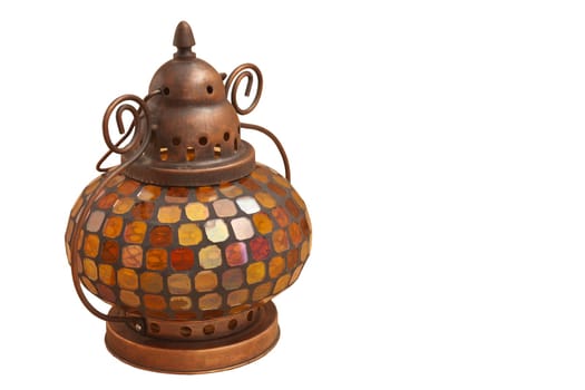 Small oriental lamp with colored glass on a white background