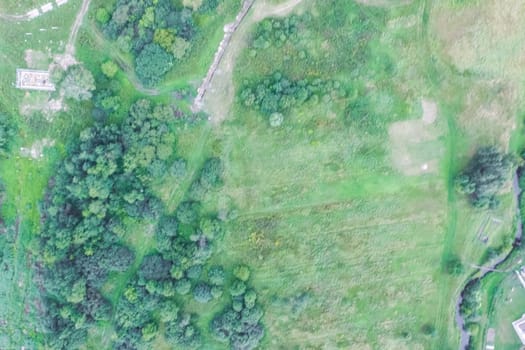 Top view of the village, fields and forests near the village