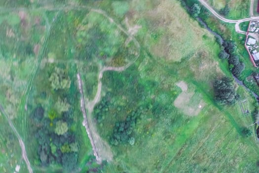 Top view of the village, fields and forests near the village