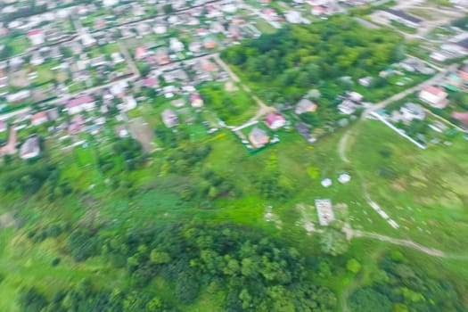 Top view of the village, fields and forests near the village