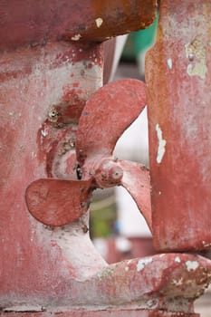Old rusty fishing boat propeller