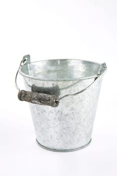 Galvanized empty bucket on a white background