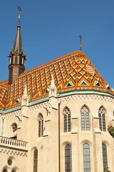 Facade and colorful roof o the Church of the Assumption of the Buda Castle, Matthias Church, Coronation Church of Buda, Budapest, Hungary 2022