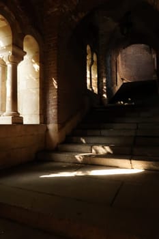 Stone stairs, vaults and windows with pillars inside the Fisherman's Bastion in the city center of Budapest, Hungary 2022