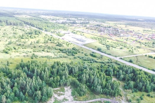Top view of the village, fields and forests near the village