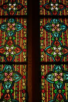 Closer look on the stained glass window behind the bust, statue of Empress Elisabeth of Austria, Sissi, Sisi inside the Matthias Church, Budapest, Hungary 2022