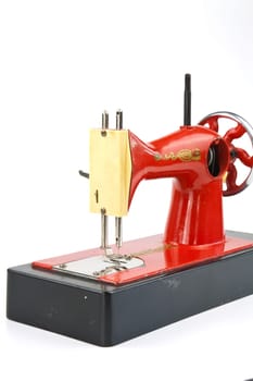 Realistically made sewing machine as a toy for practical training of children