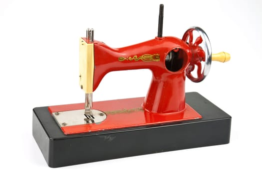 Realistically made sewing machine as a toy for practical training of children