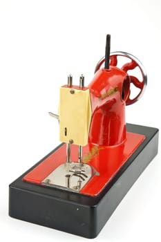 Realistically made sewing machine as a toy for practical training of children