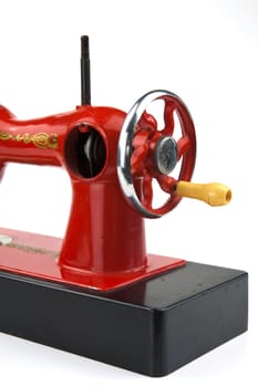 Realistically made sewing machine as a toy for practical training of children
