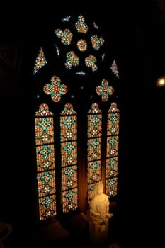 Bust, statue of Empress Elisabeth of Austria, Sissi, Sisi in front of a colorful stained glass window inside the Matthias Church, Budapest, Hungary 2022