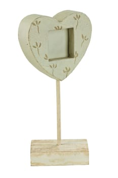 Wooden stand for a photo in the shape of heart in vintage style