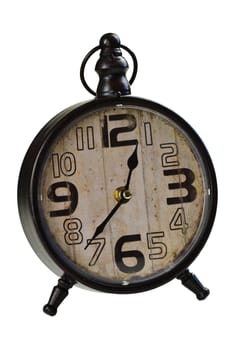 Analog desktop clock in vintage style on a white background