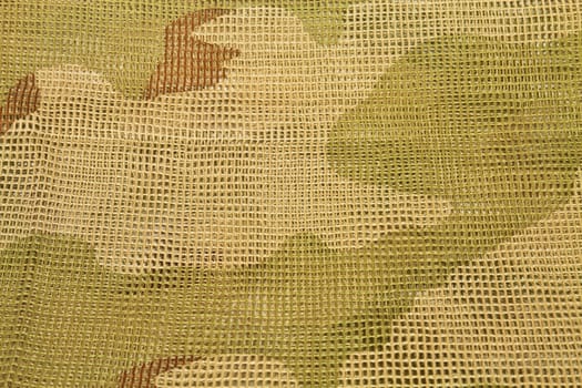 Cotton camouflage netting designed to wrap around the head or cover arms